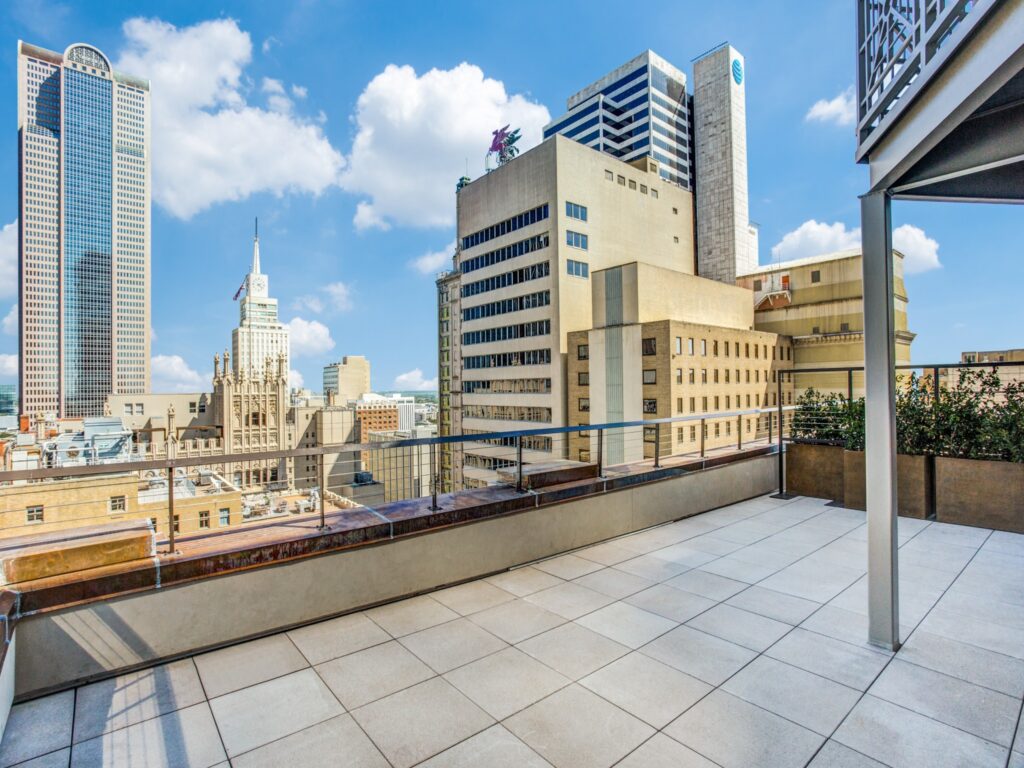 Rooftop patio with views of downtown Dallas.